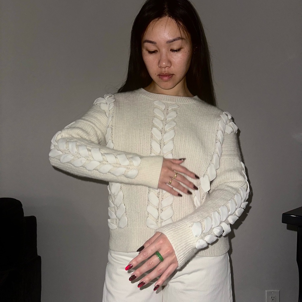 Elegant Cream Sweater with Braided Detailing